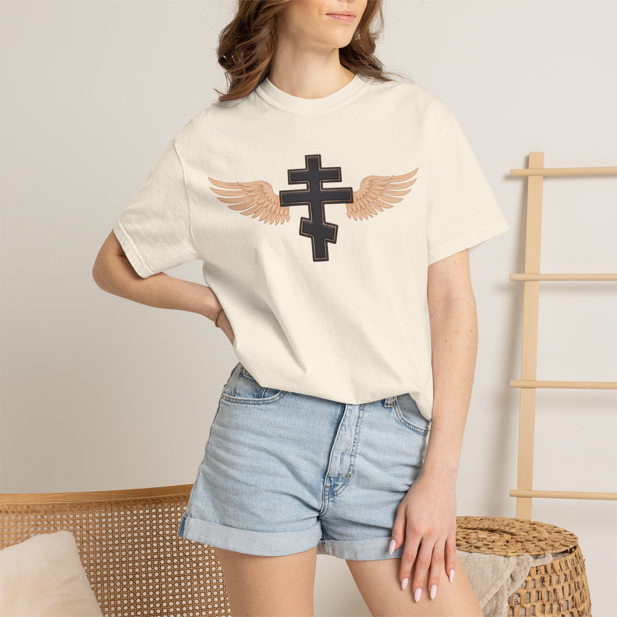 Classic black winged classic Orthodox cross design on a heavyweight garment-dyed t-shirt