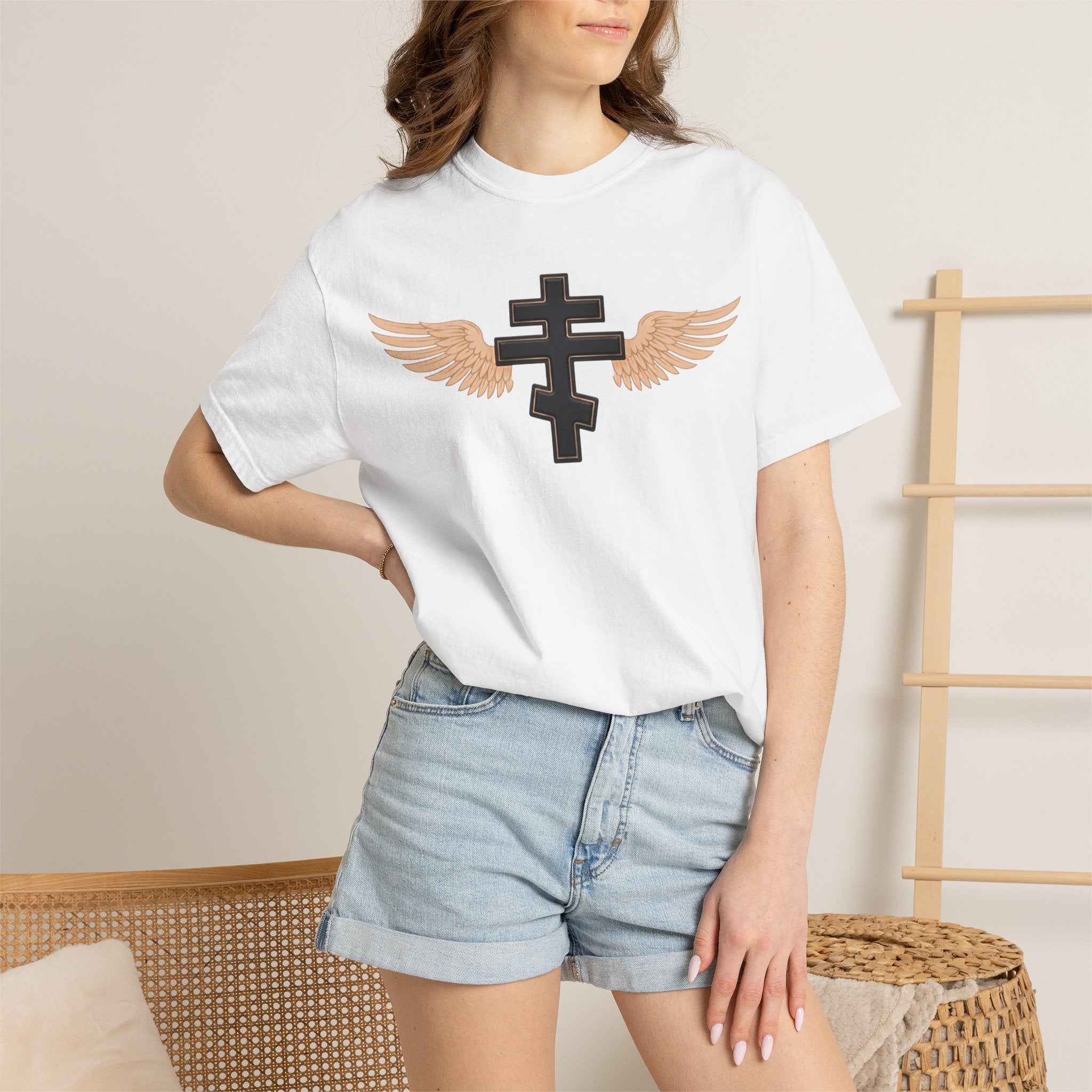 Classic black winged classic Orthodox cross design on a heavyweight garment-dyed t-shirt